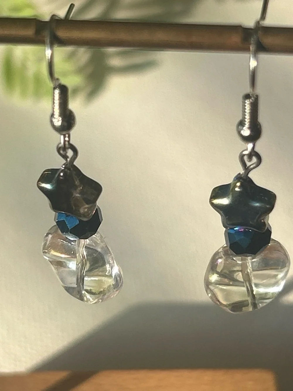 Iridescent Star Drop Earrings with Blue Accent